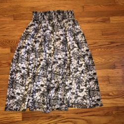 Size LARGE back and white long semi silky skirt in EXCELLENT condition. Worn once