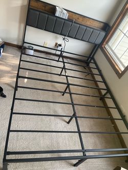 Queen-size bed in good condition.