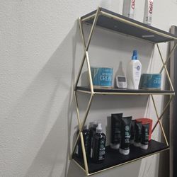 Beautiful Black And Gold Shelves 