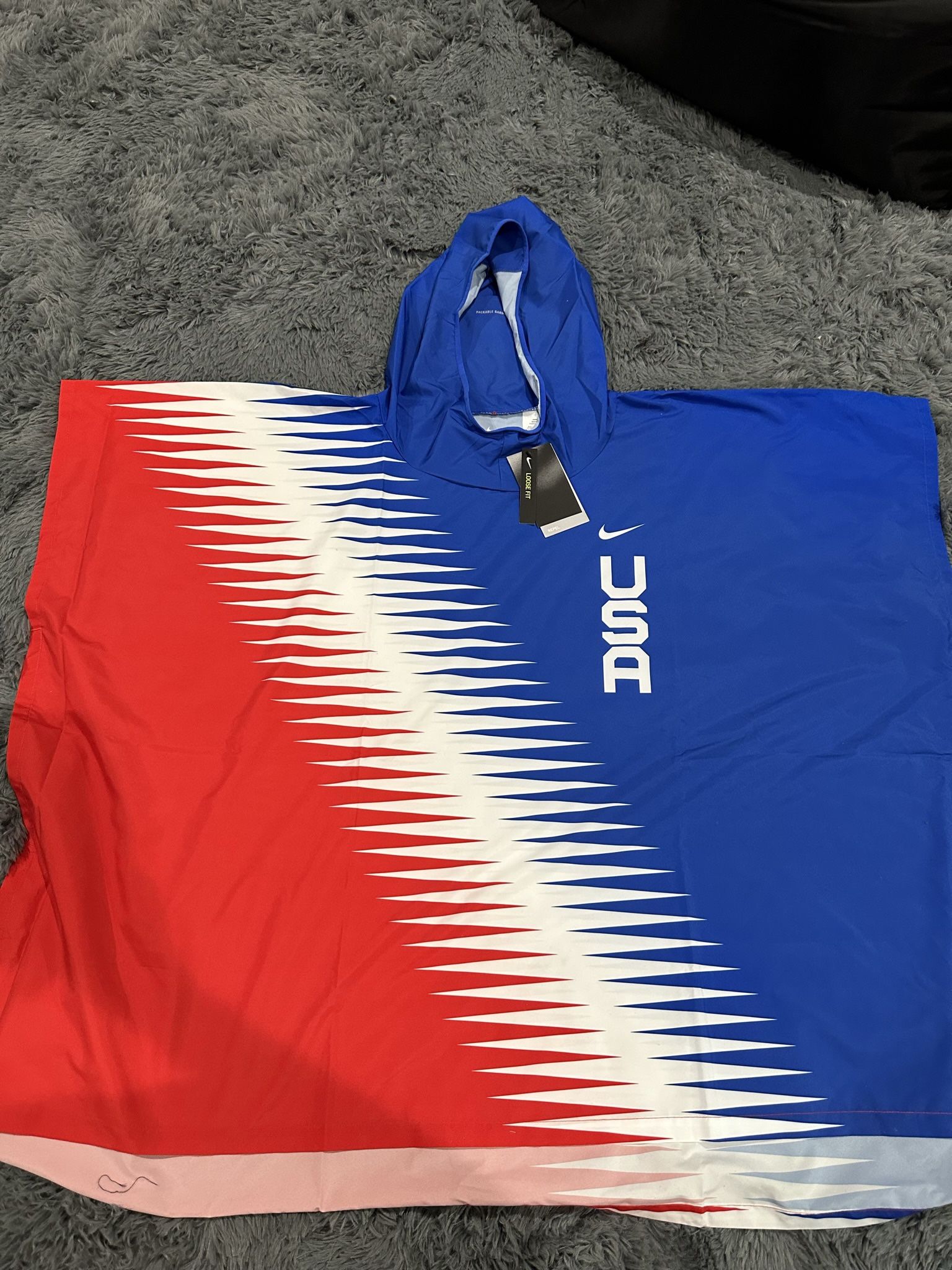 Nike Poncho And The North Face Windbreaker