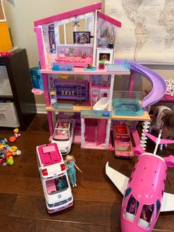 Barbie house, car, ambulance, and airplane