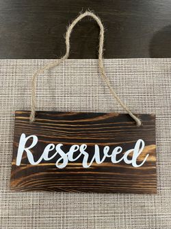 Hanging “Reserved” Signs 
