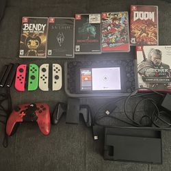 Nintendo Switch + Games + Controllers