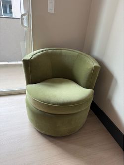 Green swivel chair