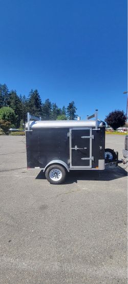 Black Enclosed Cargo Trailer with Roof Rack