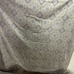 Sonoma Lifestyle shower curtain featuring a yellow, blue-gray, and tan medallion pattern
