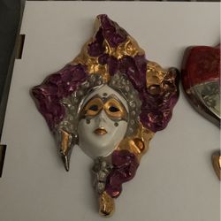 Pair Of Ceramic Decorated Face Masks