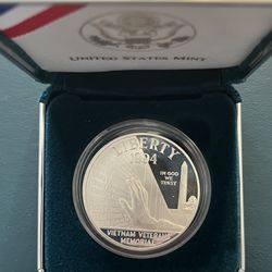 1994-P, Vietnam Veterans Memorial Commemorative Silver Dollar.