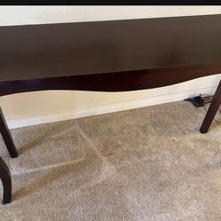 Brown Consol table. .