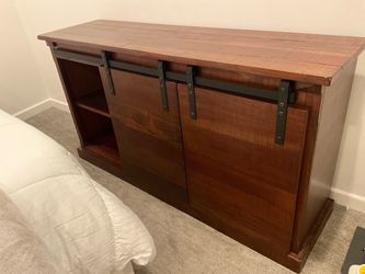 Farmhouse industrial solid wood TV console cabinet.