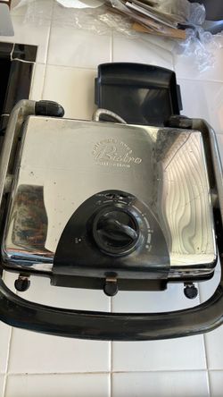 Wolfgang Puck Bistro collection Grill. Comes with extra new plates