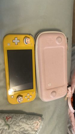 Yellow switch lite with case and thumb grip