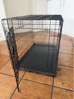 Dog crate with water bottle
