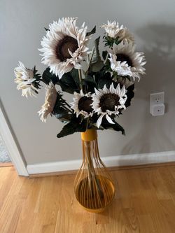 Metal vase with sunflowers, height 37 inches