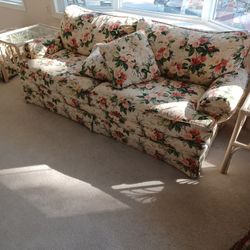 Sofa To End Tables And Decorated Shelf