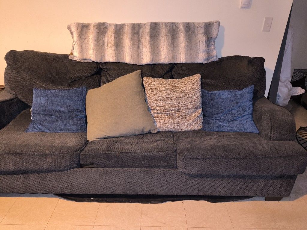 I Have A Couch In Grey Good Condition Comes With Pillows