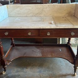 antique mahogany wash stand with a marble top