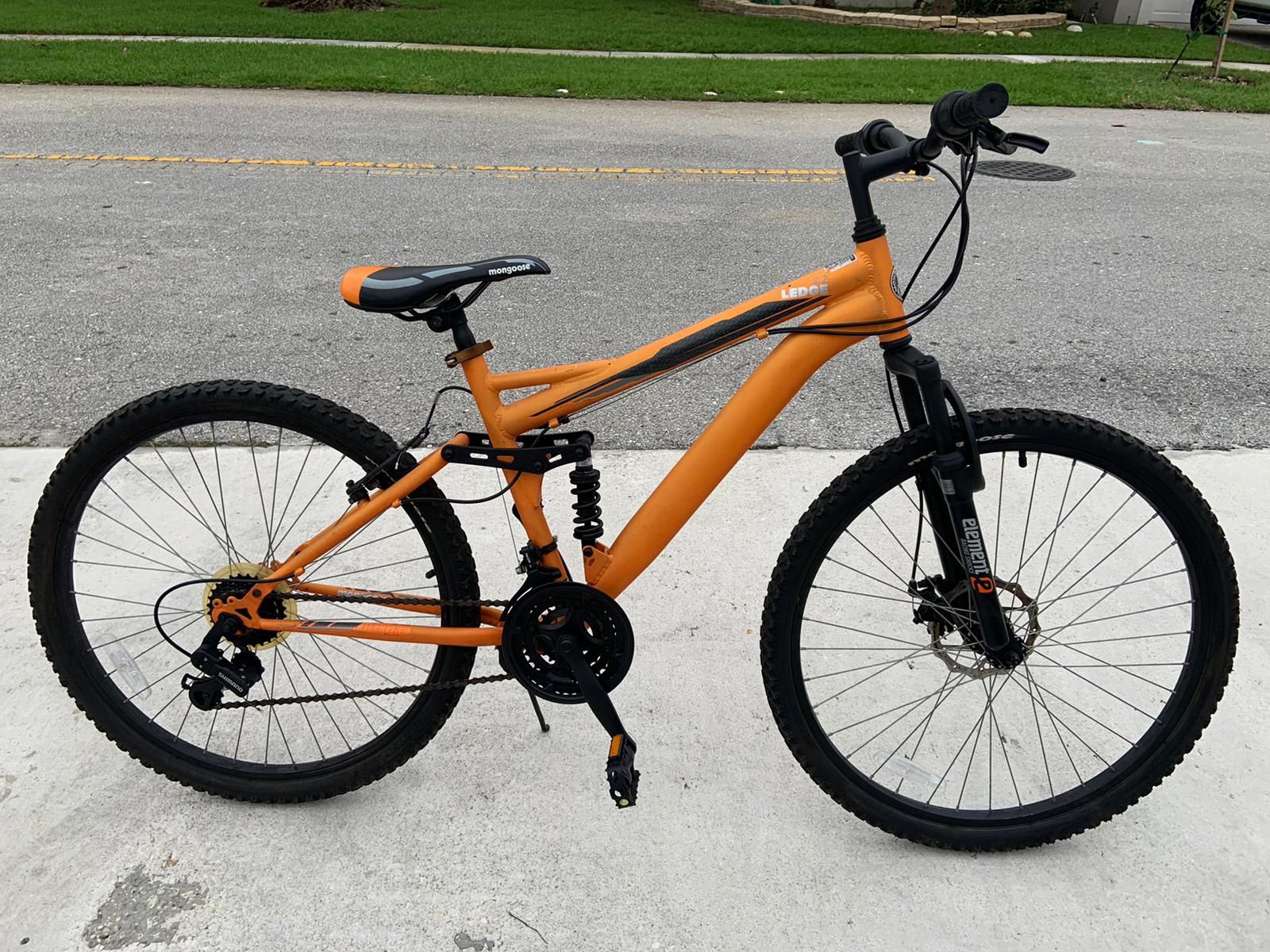 26" Mongoose Ledge 2.2 Men's Mountain Bike Color: Orange Frame: aluminum