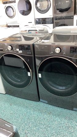 Washer 4.5 cu ft and dryer electric 7.4 cub ft front load LG BSS