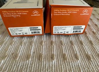 2 ADT outdoor WiFi cameras with 2 way audio v724x