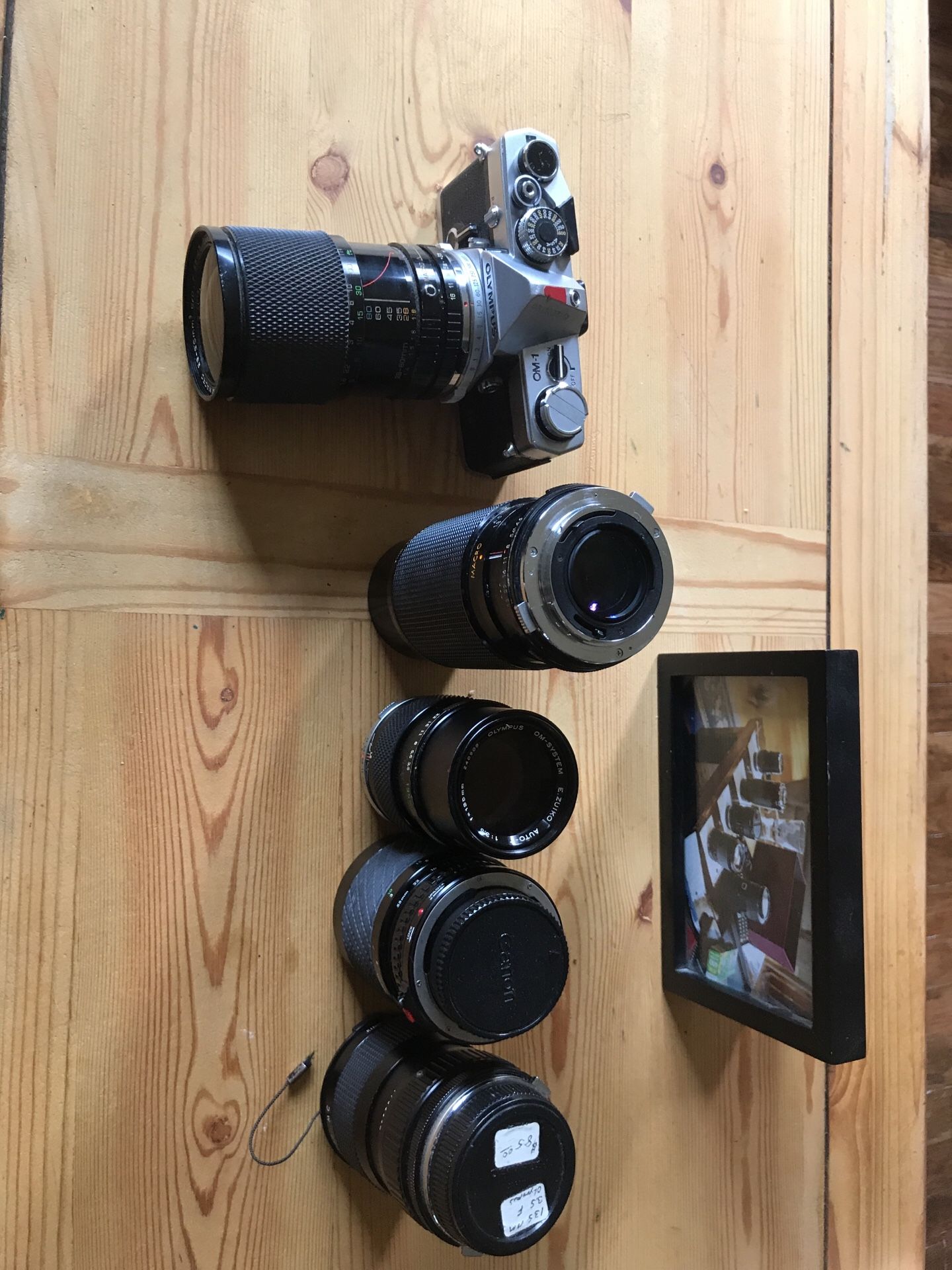 Canon camera Olympus camera and lenses