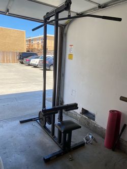 Lat pull down machine and 2x 25 lb plates