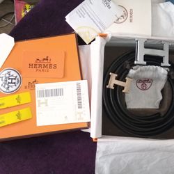 Two Hermes Belts .