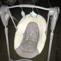 Like new adjustable baby swing only $30 firm