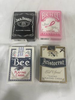 Four pack mixed used playing cards