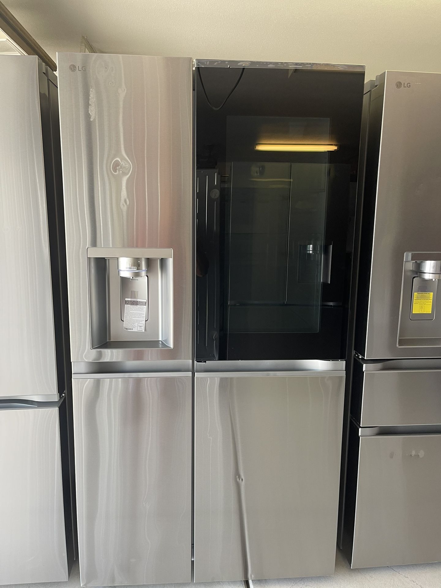 LG 27 cu.ft. Smart Side-By-Side InstaView Door-in-Door Refrigerator with Craft Ice in Stainless Stee