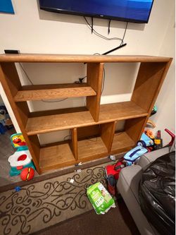 Like new wood entertainment center medium size