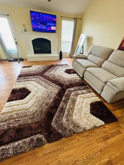 Gently used designer rug 8x12
