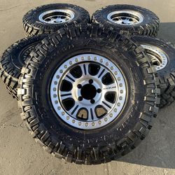 (5) Jeep Wrangler TJ REAL Raceline Beadlock Wheels and 35” Nitto Mud-Terrain Tires