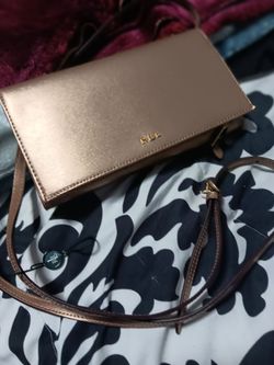 Lauren Ralph Lauren gold metallic crossbody wallet.