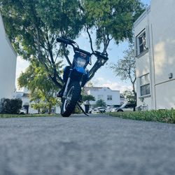 Electric kids motorcycle for Boys and girls (barley used) helmet and charger included