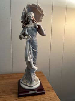 Armani flower girl figurine with umbrella