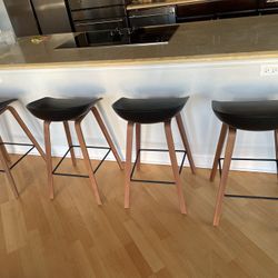 4x Design Within Reach barstools in brown
