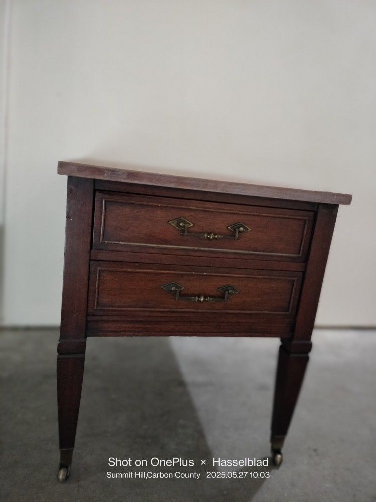 Cherry wood antique end table with wheels by Columbia furniture on wheels
