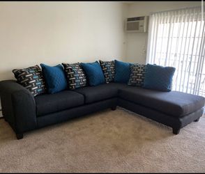 2 PIECE SECTIONAL INCLUDING ALL PILLOWS ON SALE NOW