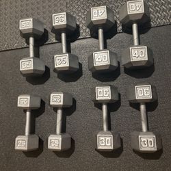 Set of Hex Cast Iron Dumbbells ( heavy) 40#, 35#, 30 and 25 #   In total: 260 pounds.