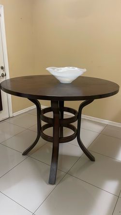 Round Dark Wood Pedestal Dining Table