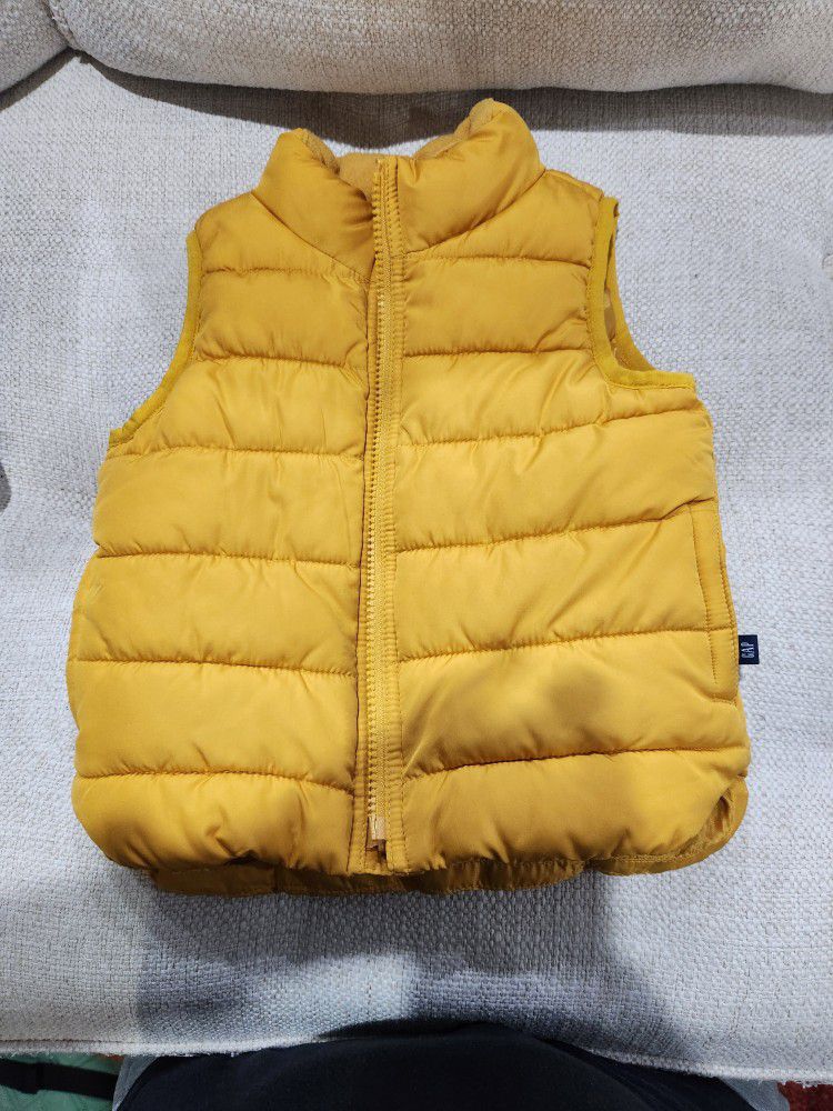 2 Gap Yellow Toddler puffer vest jackets - 12-18 and 18-24 months