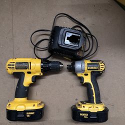 Two Dewalt Drills With Batteries And Charger