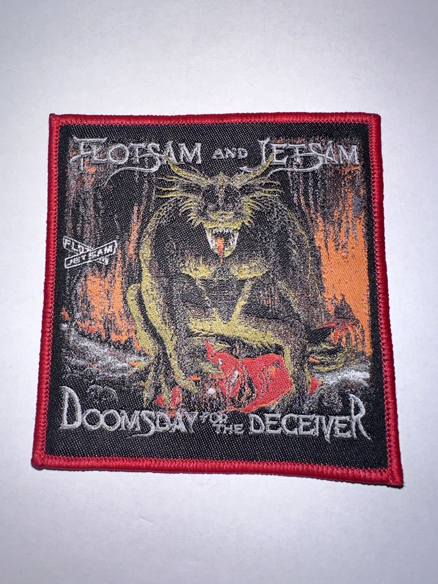 FLOTSAM AND JETSAM, DOOMSDAY FOR THE DECEIVER, SEW ON RED BORDER WOVEN PATCH