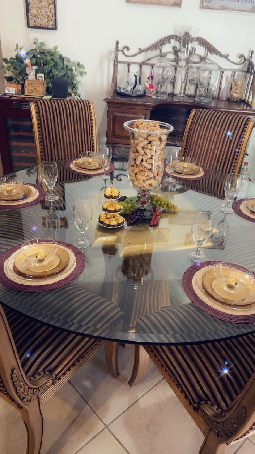 Golden round glass table with five wooden Golden chairs