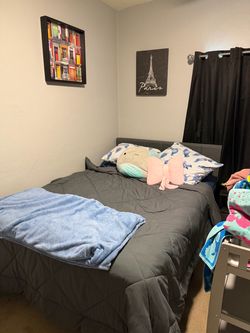 full-size mattress with boxspring and upholstered bedframe