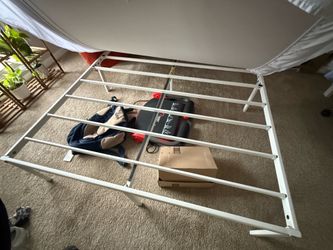 White metal full size bed frame and mattress
