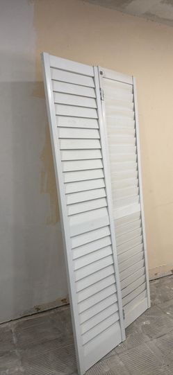 White PVC bifold closet door