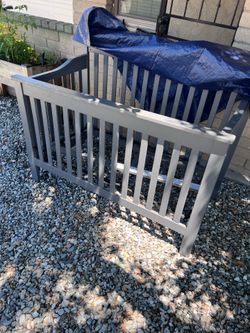 Crib with pull out bed