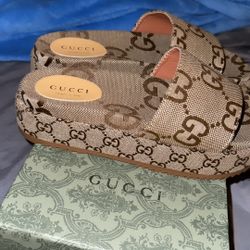 GUCCI MAXI GG CANVAS SLIDE SANDALS